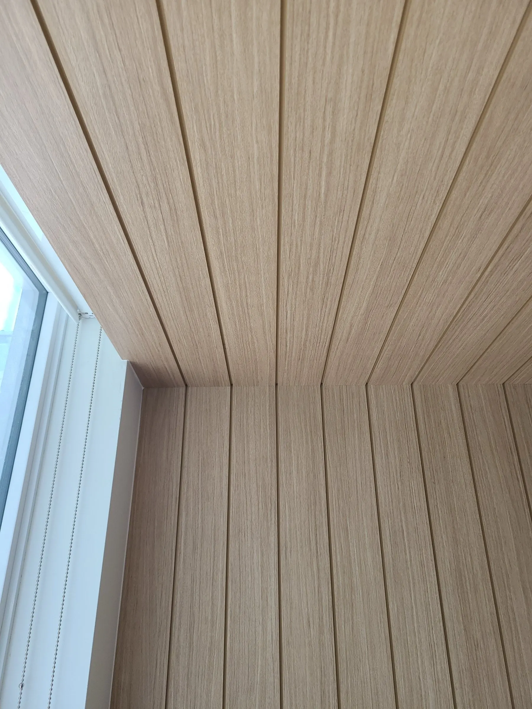 Timber-clad ceiling — Pale oak